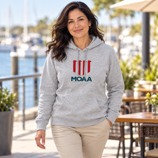 Adult woman wearing the MOAA Shield Hoodie in a lifestyle setting.