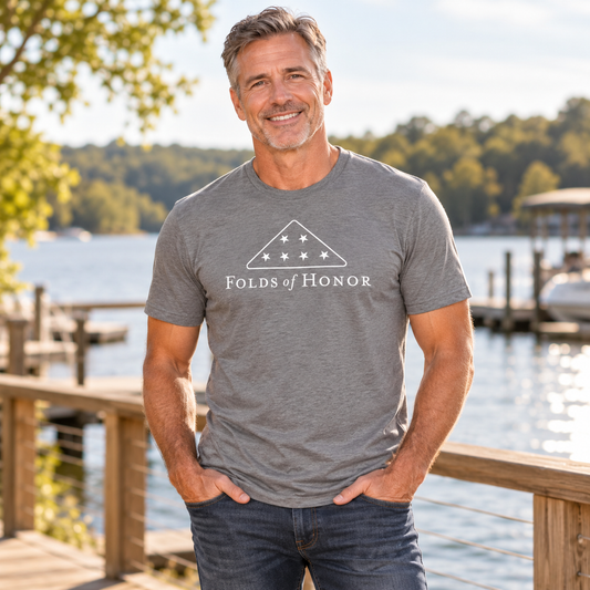 Man wearing the Folds of Honor Tee outdoors.