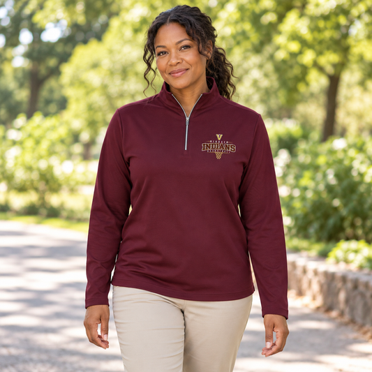 Woman wearing the Vidalia basketball quarter zip in maroon