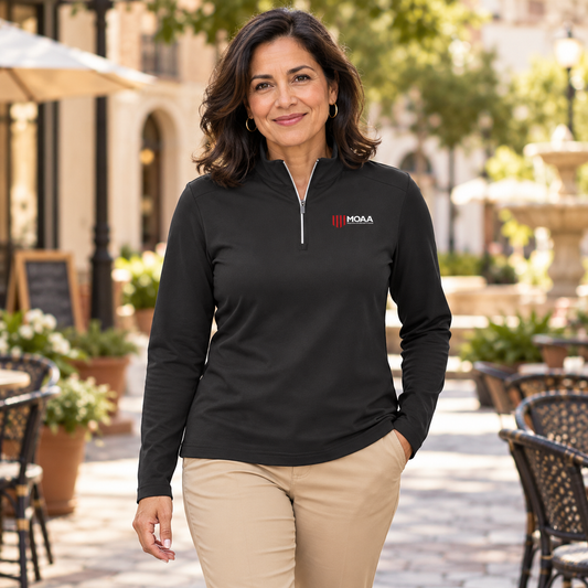 Adult woman wearing the Women's MOAA Quarter Zip in a lifestyle setting.