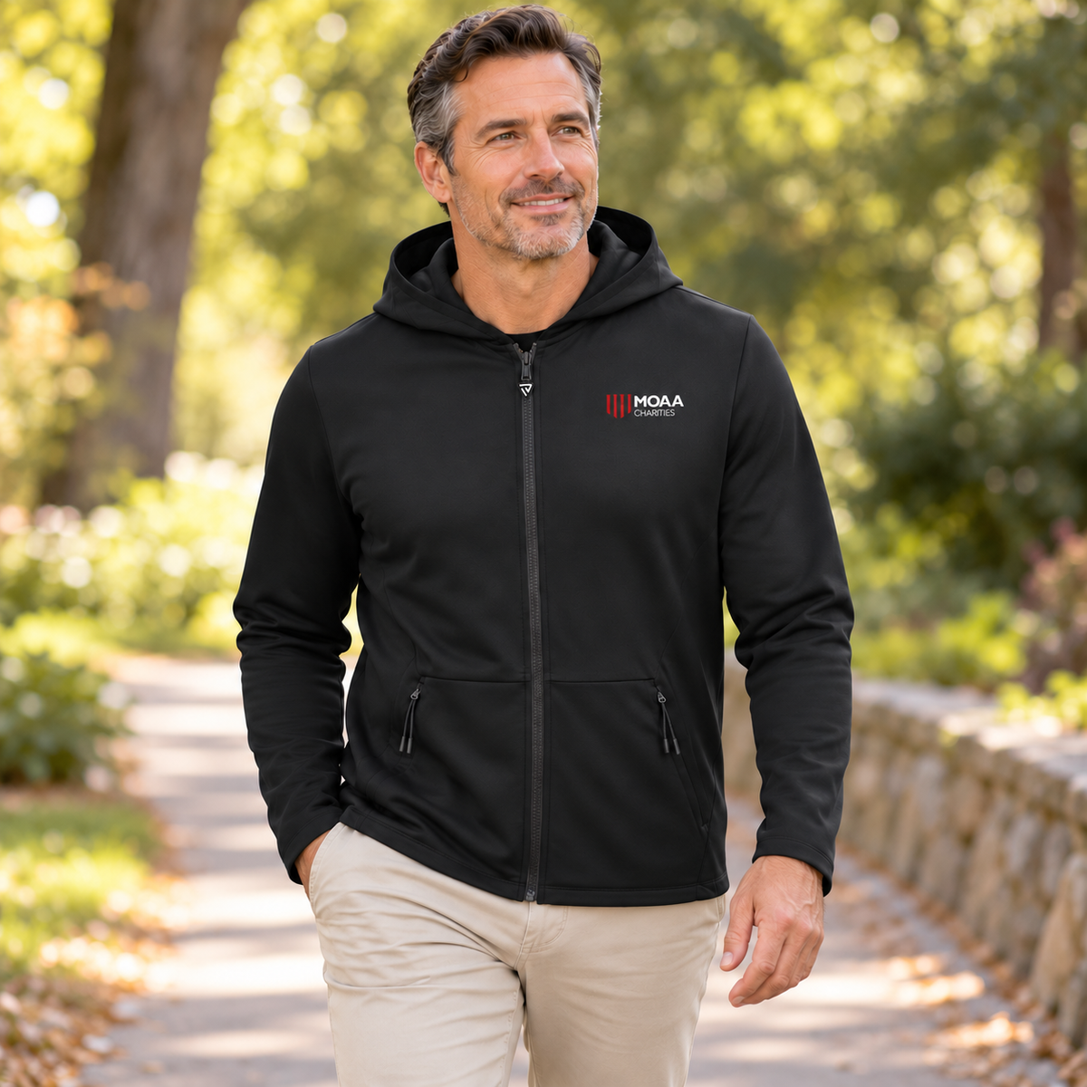 Adult man wearing the Men's MOAA Charities Elite Full-Zip in a lifestyle setting.