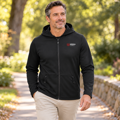 Adult man wearing the Men's MOAA Charities Elite Full-Zip in a lifestyle setting.