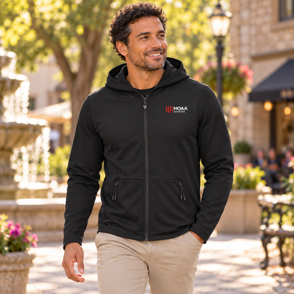 Younger adult wearing the Men's MOAA Charities Elite Full-Zip in a lifestyle setting.