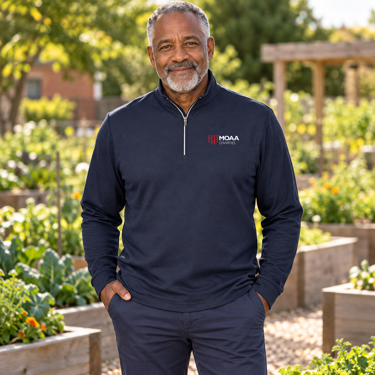 Older adult man wearing the Men's MOAA Charities Quarter Zip in a lifestyle setting.