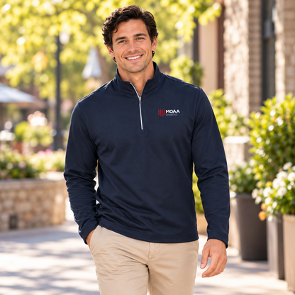 Younger adult wearing the Men's MOAA Charities Quarter Zip in a lifestyle setting.