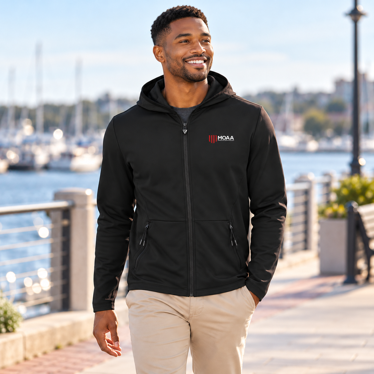Adult man wearing the Men's MOAA Elite Full-Zip in a lifestyle setting.