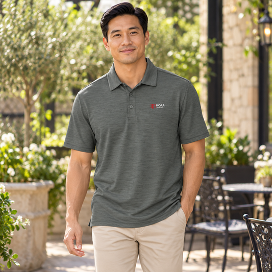 Adult man wearing the Men's MOAA Charities Polo in a lifestyle setting.