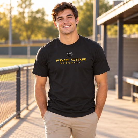 Man wearing the Five Star Baseball Dugout Black Tee outdoors.