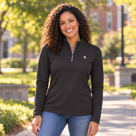 Woman wearing the HitLab Quarter Zip outdoors.