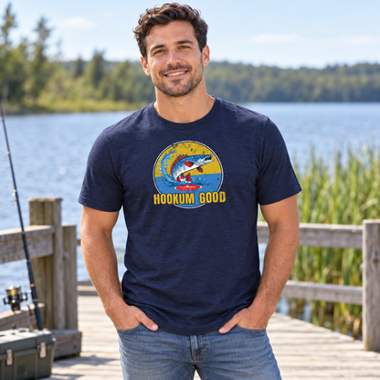 Lifestyle view of Hookum Good Born to Cast Tee by the water.