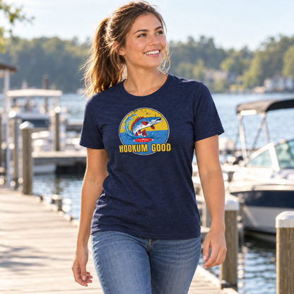 Lifestyle view of Hookum Good Born to Cast Tee by the water.