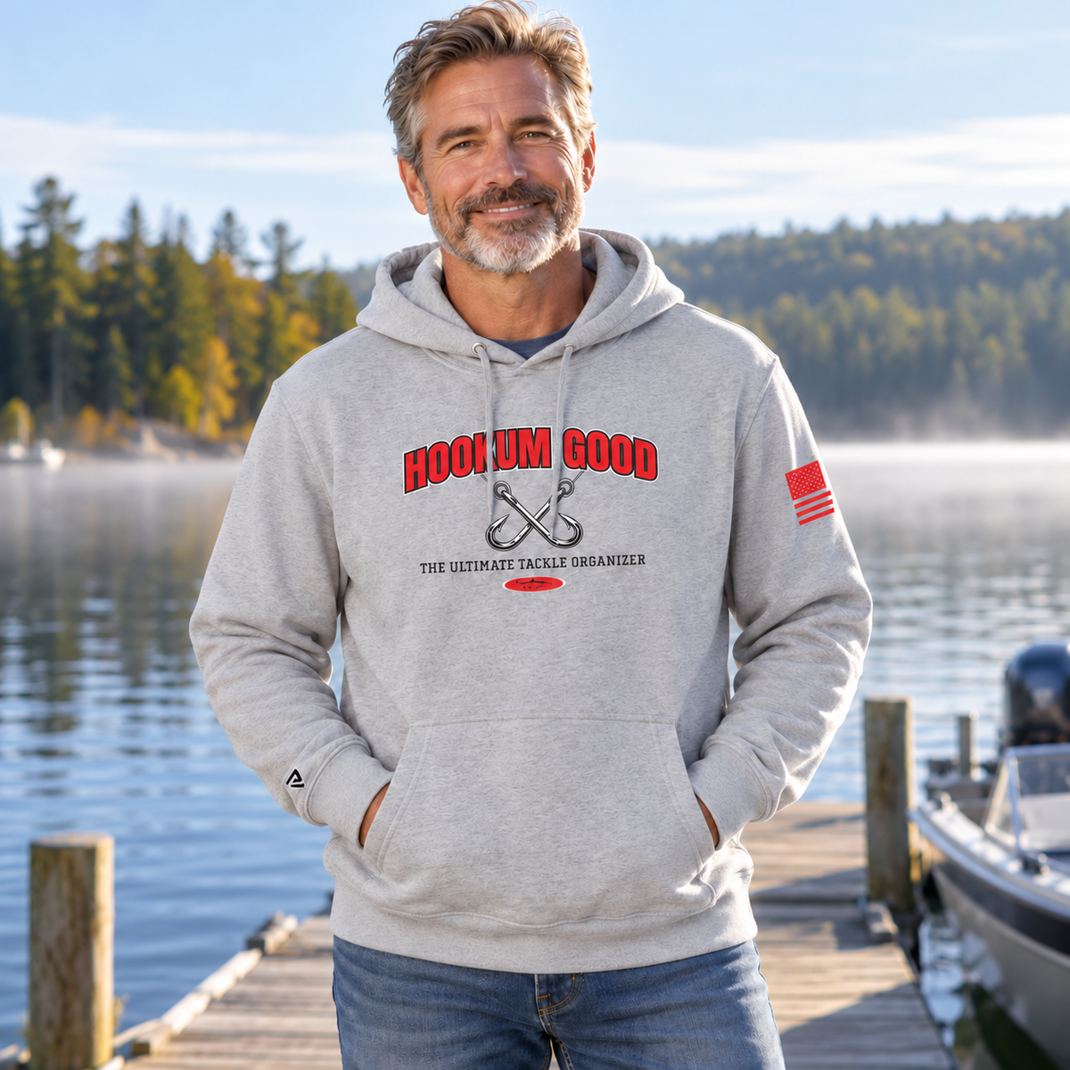 Lifestyle view of Hookum Good Stay Sharp Hoodie by the water.