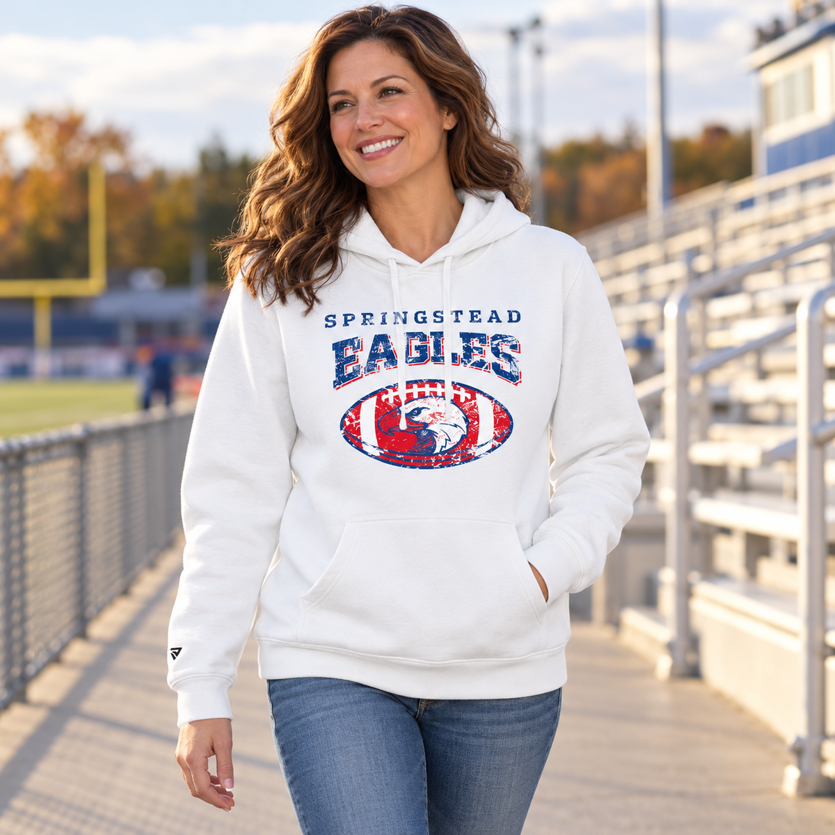 Lifestyle view of SHS Football Hoodie at an athletics setting.