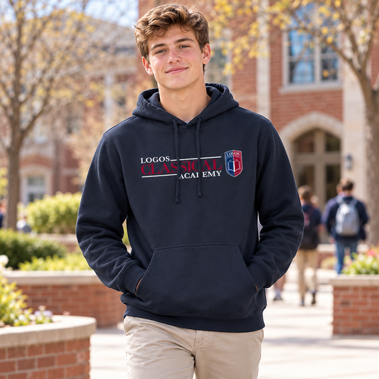 LCA Hoodie worn by an adult man in a welcoming brick school courtyard on a bright cool day; front view.