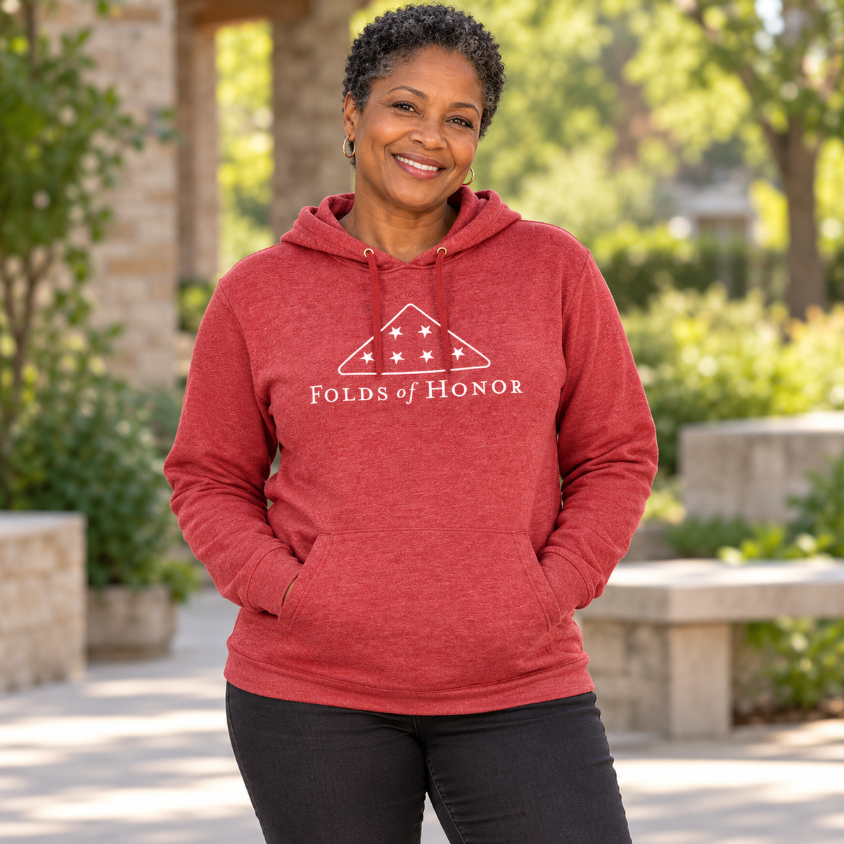 Women's Folds of Honor Heathered Hoodie worn by an adult woman outdoors; front view.