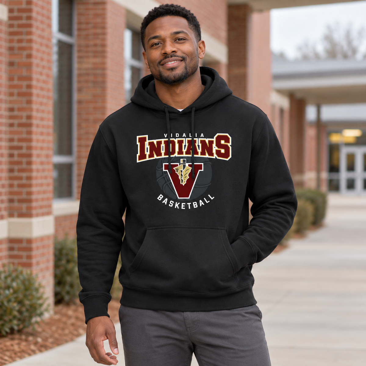 Man wearing the Vidalia Basketball Hoodie in black