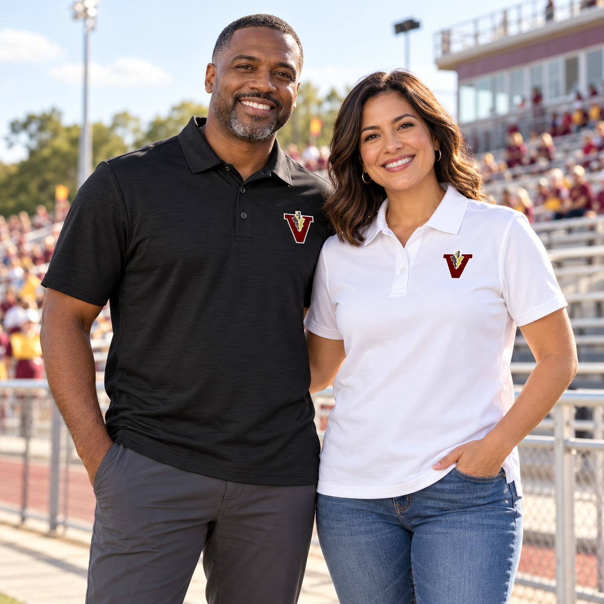 Adult supporters wearing Vidalia Classic V Polos in black and white