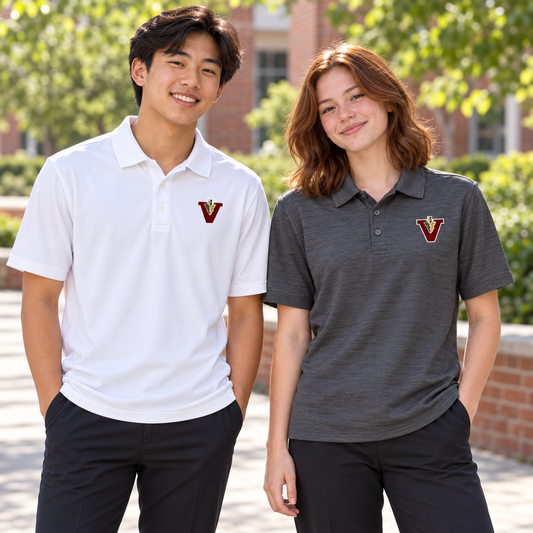 High-school-age boy and girl wearing Vidalia Classic V Polos in white and charcoal