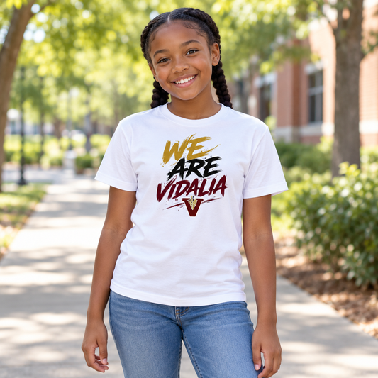 Girl wearing the Vidalia youth we are tee in white