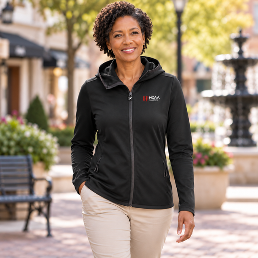 Adult woman wearing the Women's MOAA Charities Elite Full-Zip in a lifestyle setting.
